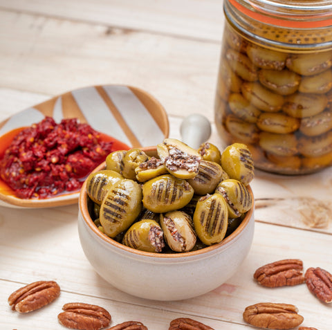 Grilled Green Olives with Labaneh Walnuts and Chili